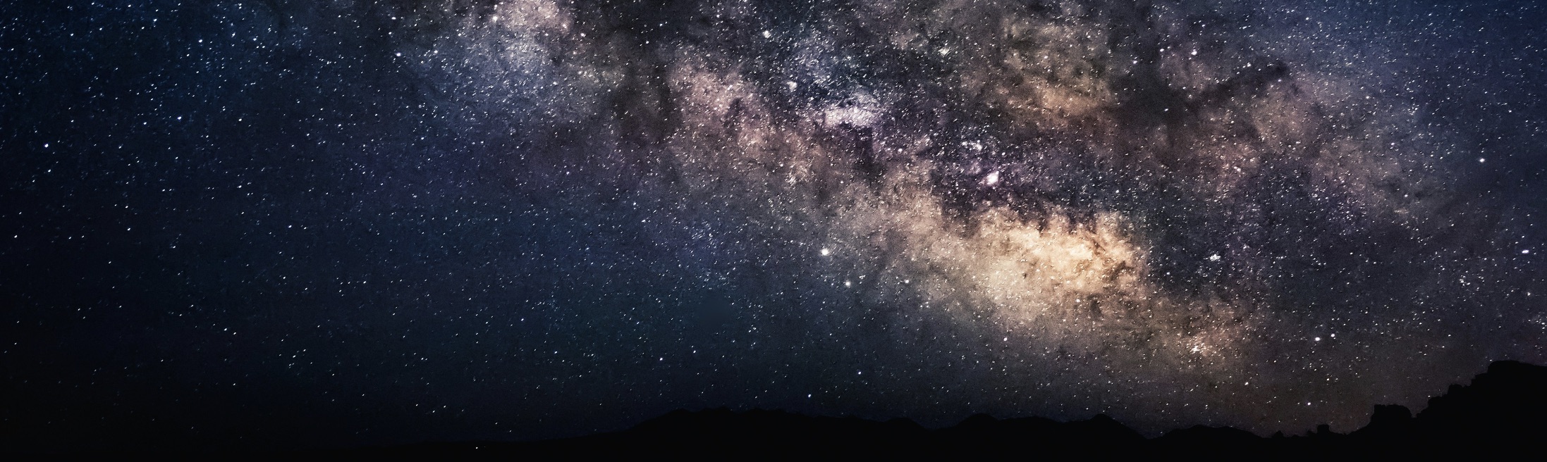 Starry night sky with Milky Way galaxy view.